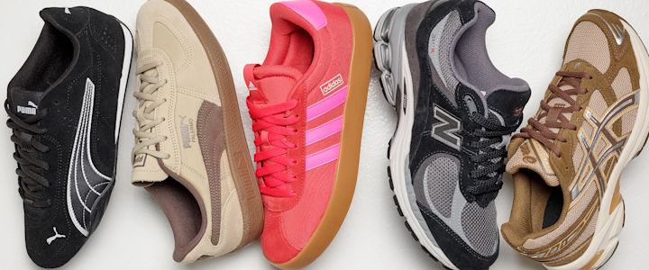 Fem sportssko på rad: svart Puma, beige Puma, rød/rosa Adidas med gummisåle, grå/svart New Balance og brun Asics.