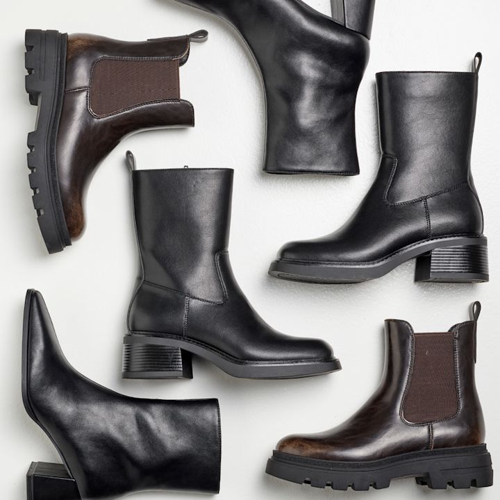 Ulike typer boots i svart og brun, inkludert chelsea boots og ankelboots med kraftige såler og hæler.